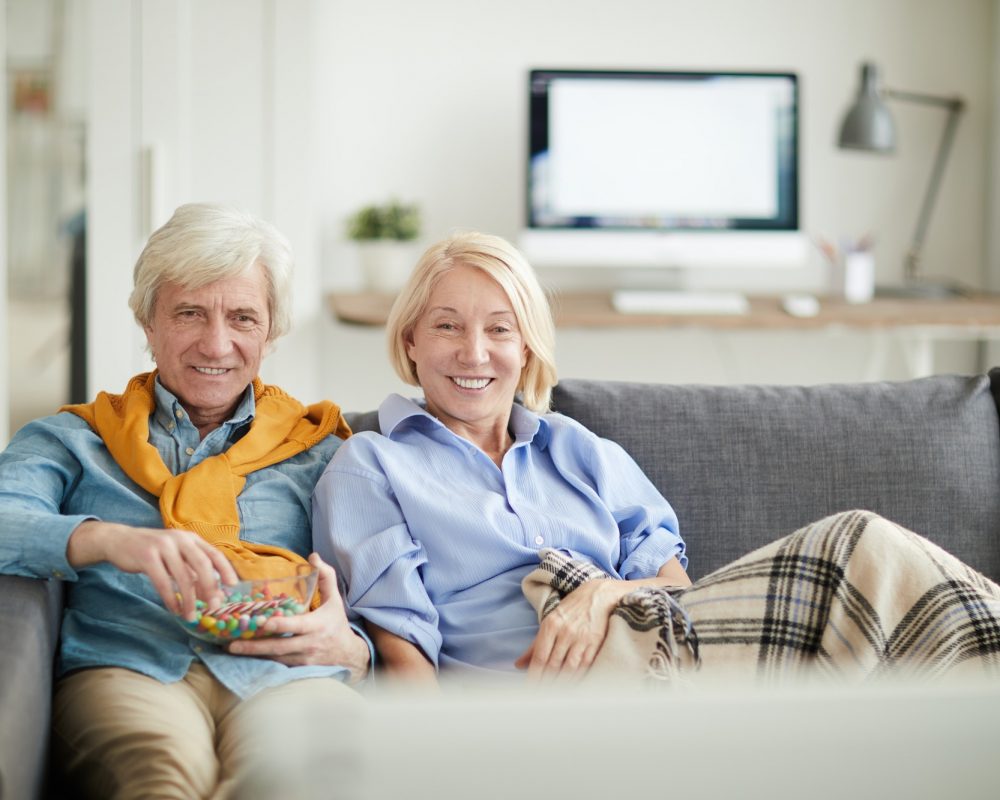 modern-senior-couple-watching-tv.jpg
